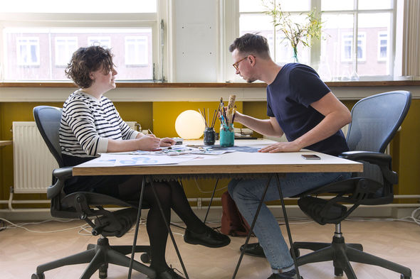 IMAGE: Photo – Jurjen and Ashley working at desk